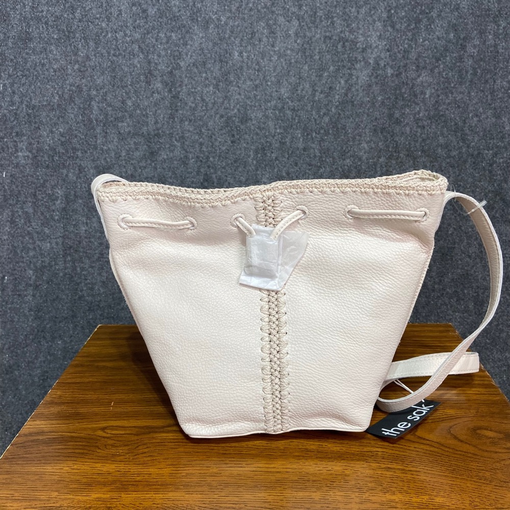 The Sak Ivy Leather Drawstring Bucket Bag Stone Beige Crochet Trim 109445 New